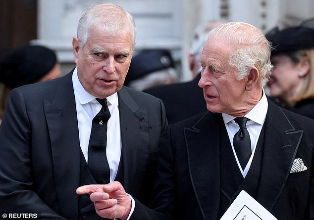 Prince Andrew speaks with King Charles as they leave Westminster Cathedral on the day of the funeral of the Duchess of Kent