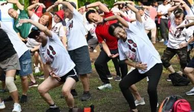 Health Minister Ong Ye Kung taking part in a mass cool-down exercise at a new brisk walking movement in Sembawang Central on April 12.