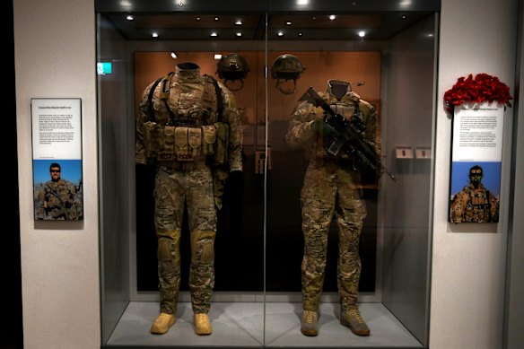 The Australian War Memorial display of Ben Roberts-Smith’s military uniform (left) taken last year. The display remains in place in the Hall of Valour.