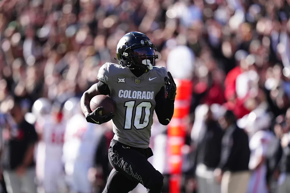 Nov 16, 2024; Boulder, Colorado, USA; Colorado Buffaloes wide receiver LaJohntay Wester (10) returns a punt for a touchdown the first quarter against the Utah Utes at Folsom Field. Mandatory Credit: Ron Chenoy-Imagn Images