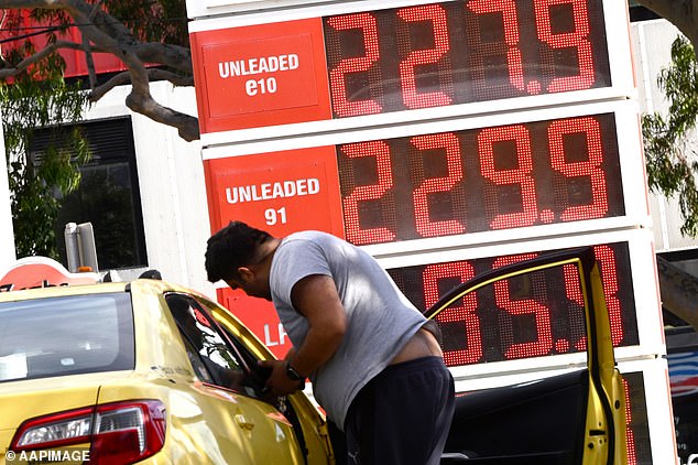 Signage showing fuel prices at a petrol station in Melbourne, Wednesday, April 1, 2026. The fuel excise will be halved for three months as a temporary cost-of-living measure, taking 26.3 cents a litre off the price at the pump. (AAP Image/Joel Carrett) NO ARCHIVING