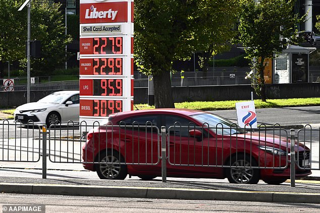 Signage showing fuel prices at a petrol station in Melbourne, Wednesday, April 1, 2026. The fuel excise will be halved for three months as a temporary cost-of-living measure, taking 26.3 cents a litre off the price at the pump. (AAP Image/Joel Carrett) NO ARCHIVING