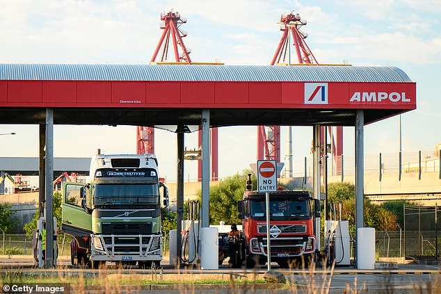 SYDNEY, AUSTRALIA - APRIL 02: Drivers refuel trucks with diesel fuel at Ampol gas station in Port Botany on April 02, 2026 in Sydney, Australia. Australian Prime Minister Anthony Albanese urged citizens to back the temporary reduction in fuel excise and a cut to truck road use charges, saying both measures would deliver immediate relief at the bowser and in freight costs, and called on Australians to hold their local representatives accountable for the cost-of-living crisis. (Photo by George Chan/Getty Images)