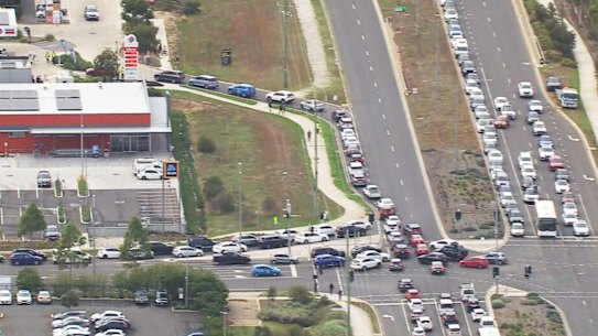 Cars lined up around the block to try and snag a free tank of fuel at the Liberty in Truganina. 