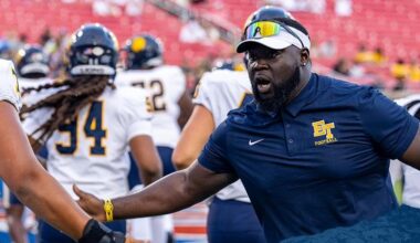 Michael Smith joins football staff as defensive line coach