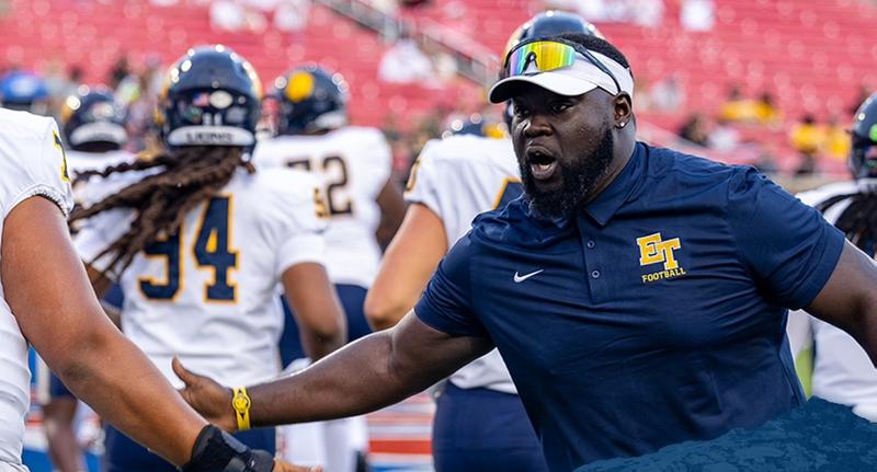 Michael Smith joins football staff as defensive line coach