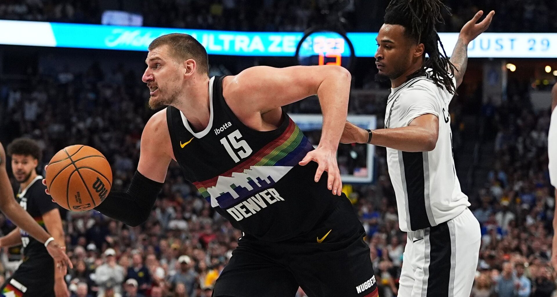Nuggets end Spurs' win streak with 136-134 win in OT