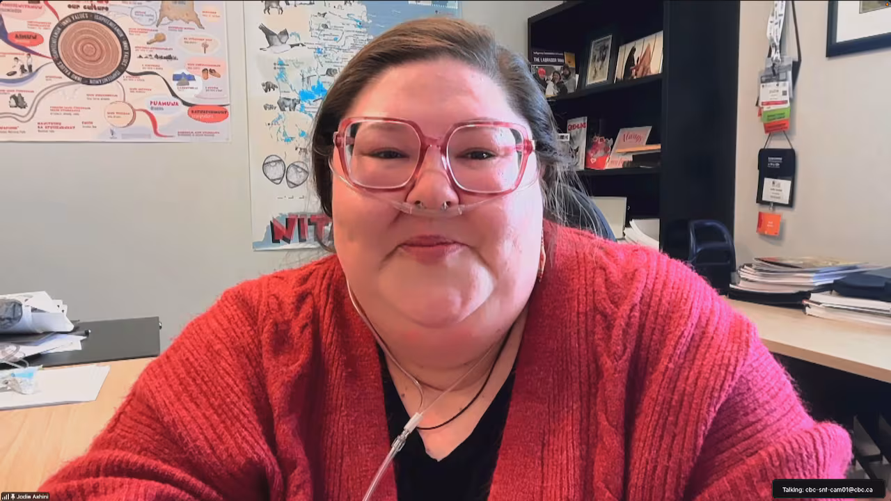 Woman smiles in zoom photo