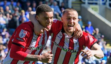 Ryan One of Lincoln City, left, celebrates scoring the opening goal with team-mate Tom Hamer
