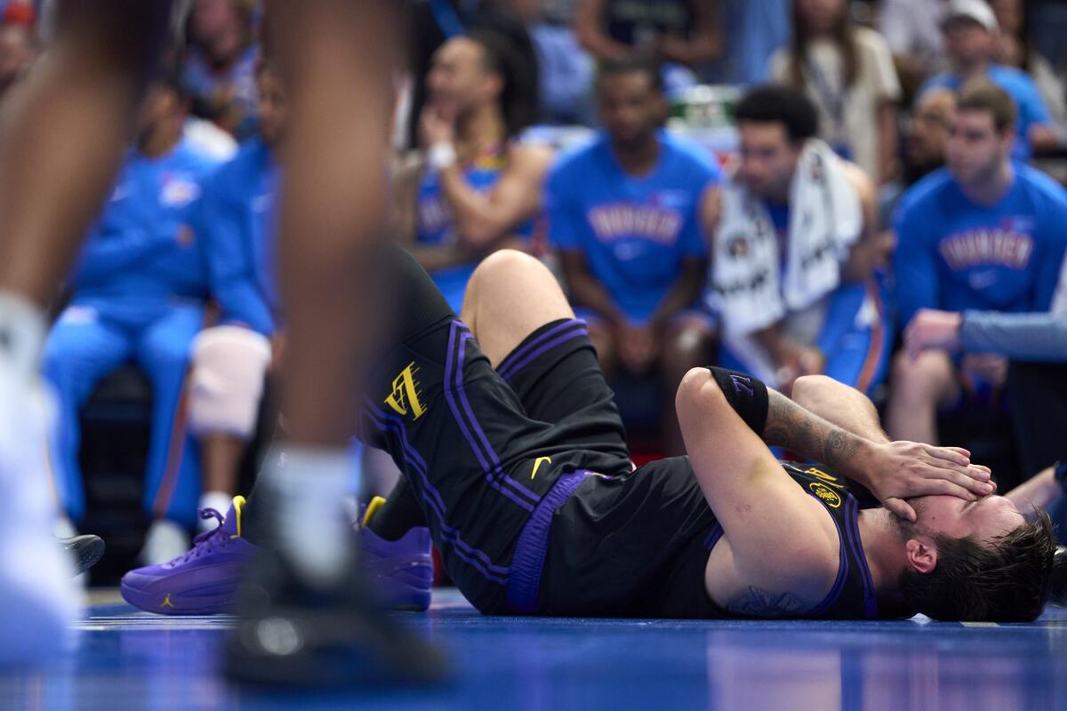 Lakers star Luka Doncic reacts after sustaining a hamstring injury against the Oklahoma City Thunder on April 2.