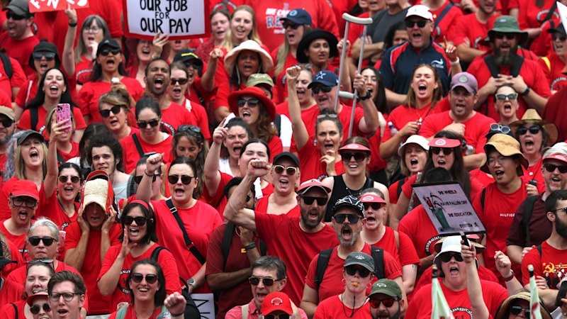 Teachers agree to stage half-day strikes across Victoria in term two