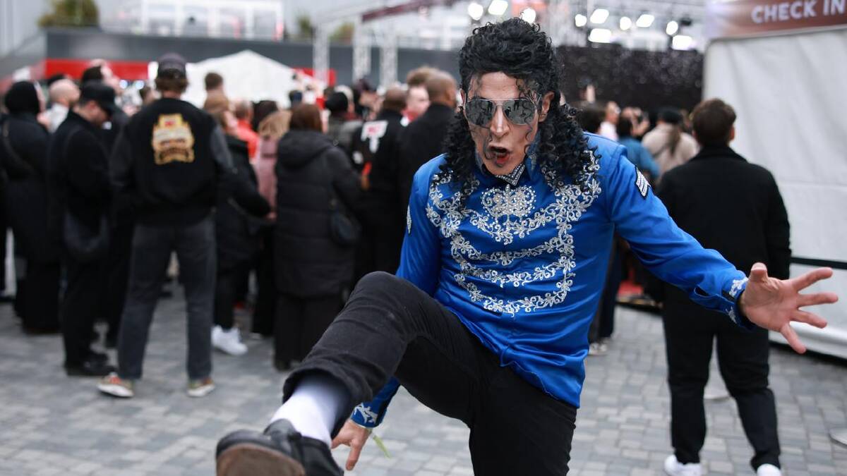 Many fans dressed as their idol for the biopic premiere. (EPA PHOTO)