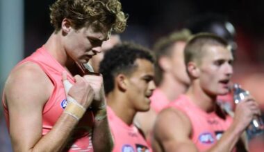The Suns players had plenty to reflect on after their loss to the Sydney Swans in Adelaide.  Photo: Matt Turner/AAP PHOTOS