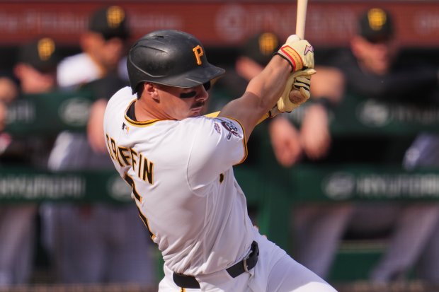 Pittsburgh Pirates' Konnor Griffin doubles off Baltimore Orioles pitcher Kyle Bradish, driving in a run, for his first Major League hit, and RBI in his first Major League at-bat during the second inning of a baseball game in Pittsburgh, Friday, April 3, 2026. (AP Photo/Gene J. Puskar)