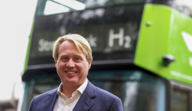 Jo Bamford discussing JCB inheritance tax implications at a business conference, emphasizing financial strategies.