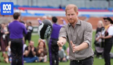 Prince Harry shows off footy skills at men's mental health event in Melbourne's west
