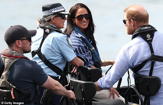 SYDNEY, AUSTRALIA - APRIL 17: Prince Harry, Duke of Sussex and Meghan, Duchess of Sussex are escorted via Police boat to the sailing boat for a cruise along Sydney Harbour on April 17, 2026 in Sydney, Australia. The Duke and Duchess of Sussex are on a four-day visit to Australia, with engagements across Melbourne, Canberra and Sydney. (Photo by Cameron Spencer/Getty Images)