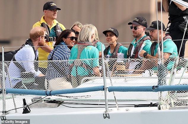 SYDNEY, AUSTRALIA - APRIL 17: Prince Harry, Duke of Sussex and Meghan, Duchess of Sussex sail on Sydney Harbour with members of Invictus Australia on April 17, 2026 in Sydney, Australia. The Duke and Duchess of Sussex are on a four-day visit to Australia, with engagements across Melbourne, Canberra and Sydney. (Photo by Cameron Spencer/Getty Images)