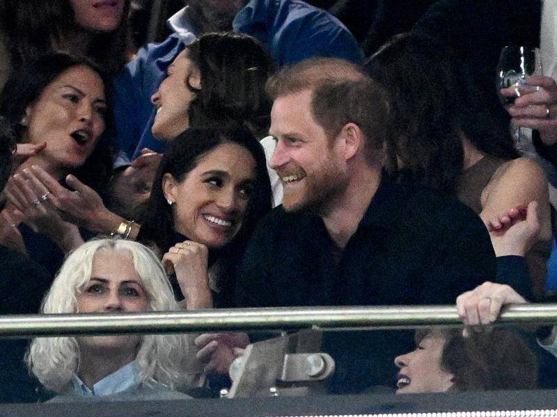 Prince Harry and Meghan joined the crowd at Allianz Stadium for a Super Rugby Pacific game. Photo: Dan Himbrechts/AAP PHOTOS