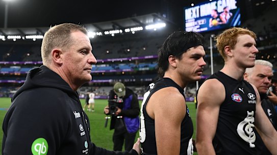 Voss and Hollands leave the field.