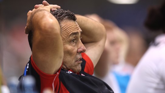 Shane Flanagan watches on as the Dragons slump to defeat against Manly on Friday night.