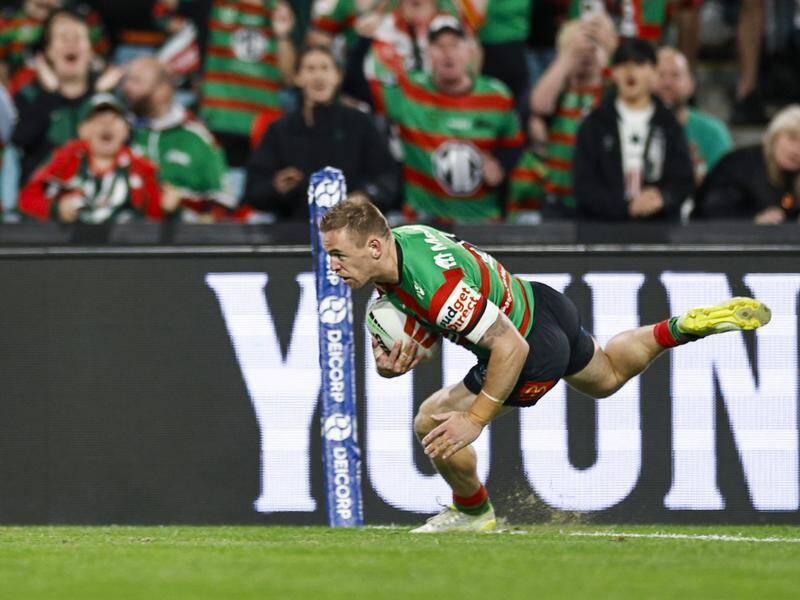 Rabbitohs' Matthew Dufty scores a try just hours after a hospital emergency with his baby. Photo: Mark Evans/AAP PHOTOS