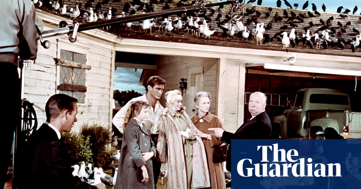 Handcuffs, dog bites and avian warfare: how personal grudges sullied Alfred Hitchcock’s reputation | Alfred Hitchcock
