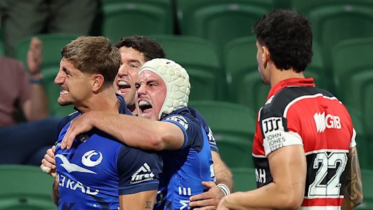 Zac Lomax celebrates scoring for the Western Force on Saturday night.