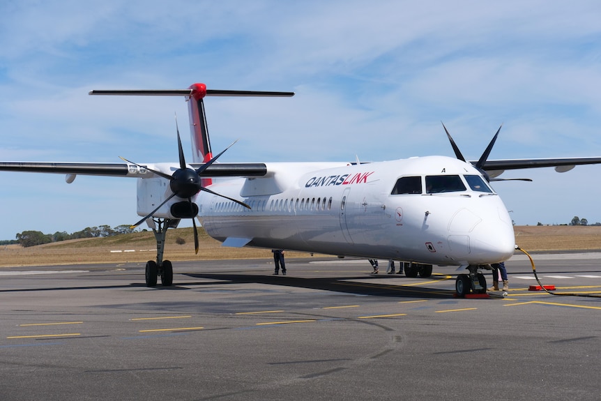A QantasLink plane on the tarmac