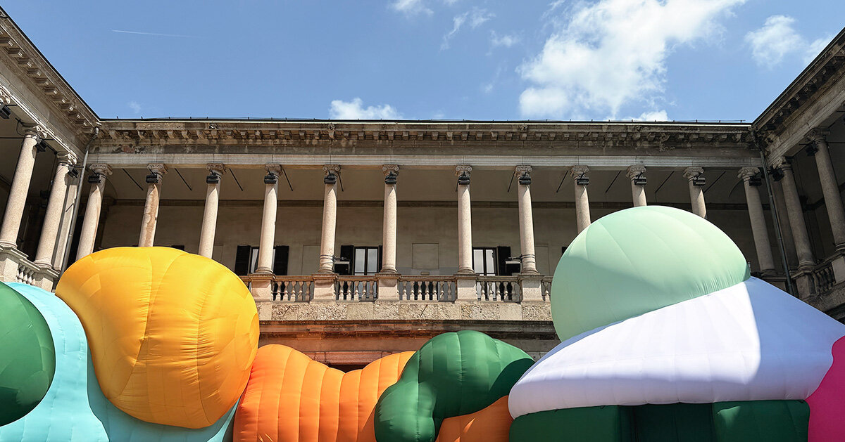 inflatable clay-like landscape by ulises studio fills palazzo del senato in milan with color