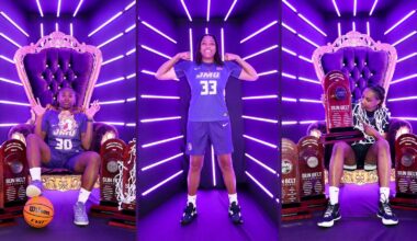 Women's basketball celebrates with Sun Belt trophy and signage at the Sun Belt Conference Championship at the Pensacola Bay Center