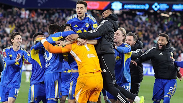 Leeds United celebrate their victory in the penalty shootout.