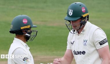 Matthew Waite punches fists with Brett D'Oliveira while batting for Worcestershire