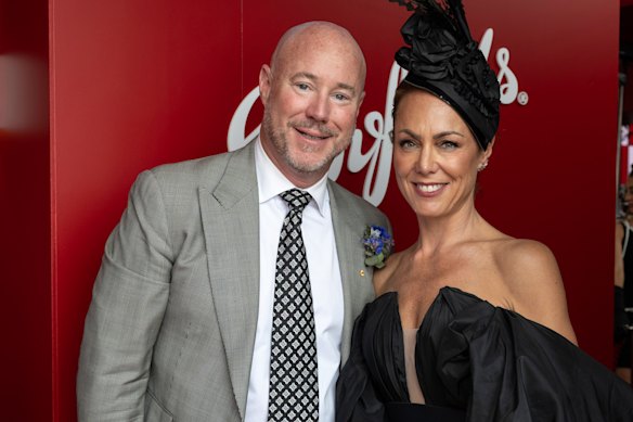 Luke and Cate Sayers at Derby Day in Melbourne in 2024, months before the lewd photo scandal erupted.