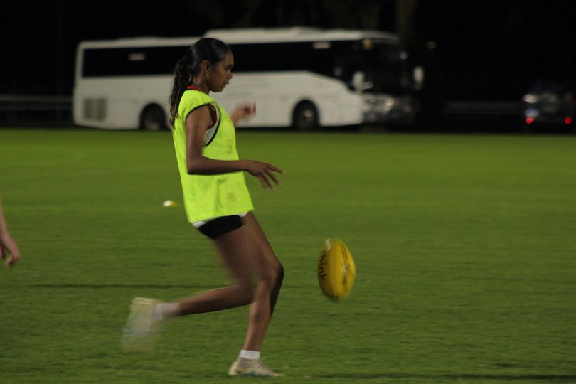 Aleisha Ugle kicking. 