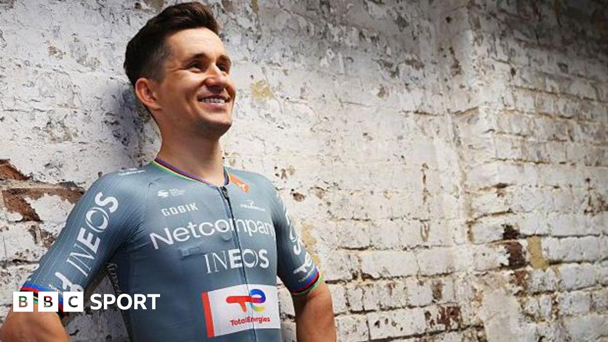 Michal Kwiatkowski models the new Netcompany-Ineos Cycling Team jersey