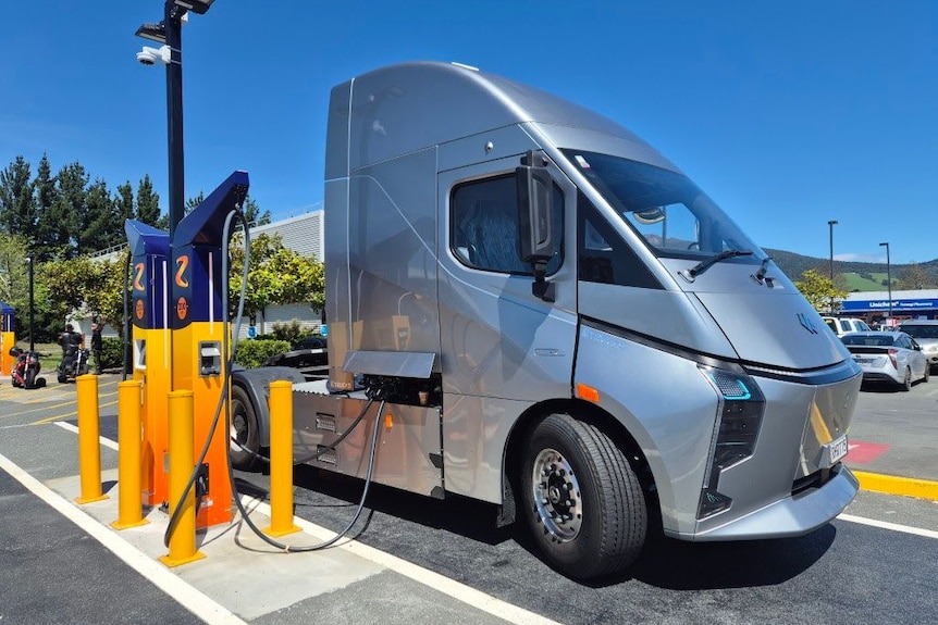 An electric prime-mover plugged in to recharge.