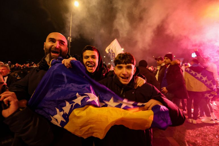 Bosnian supporters celebrate after Bosnia and Herzegovina beat Italy on penalties in a FIFA World Cup 2026 European playoff final, in Zenica, Bosnia and Herzegovina, April 1, 2026. REUTERS/Amel Emric