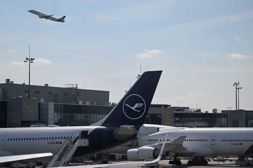Planes sit on a tarmac at Frankfurt Airport, Germany, on April 15, 2026.
