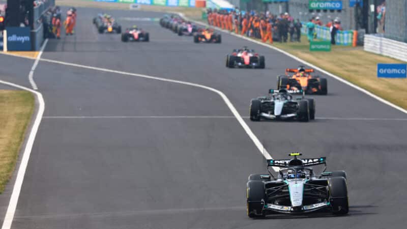 Kimi Antonelli (Mercedes) leads the field on the parade / warm up lap before the 2026 Japanese Grand Prix