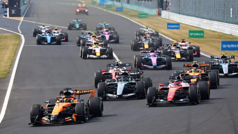 Oscar Piastri (McLaren-Mercedes) takes the lead at the start of the 2026 Japanese Grand Prix