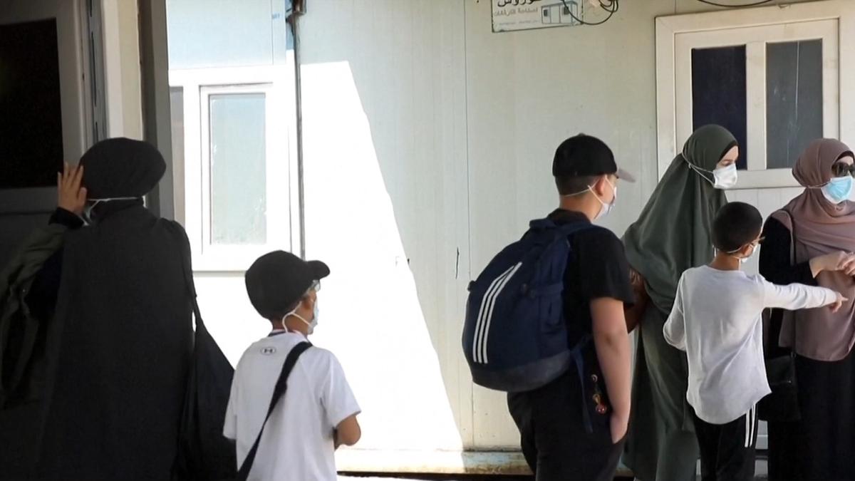 Islamic State-linked women and children flee Syrian camp bound for Australia