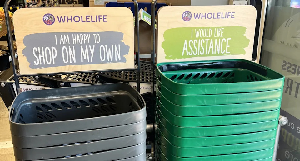 Customers should use a grey basket if they're happy to shop without interruption or a green basket if they require assistance from staff. Photo: Reddit