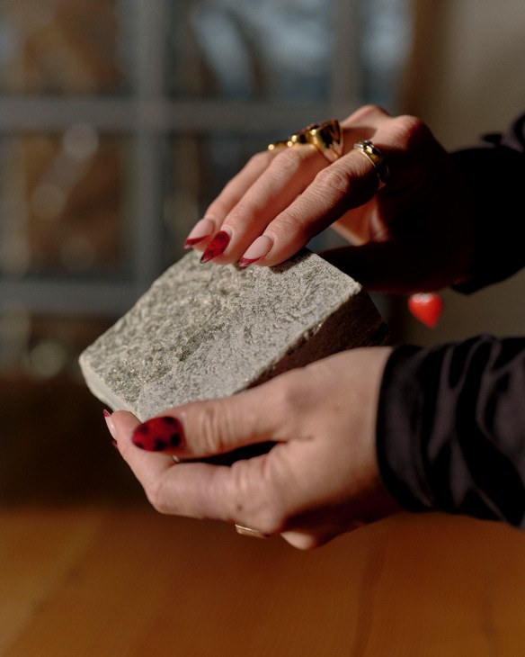 Person holding materials from Second Edition