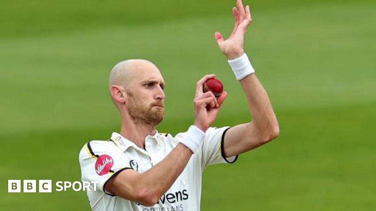 Olly Hannon Dalby bowls a ball during a match