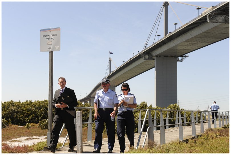 Police under the West Gate Bridge after Darcey Freeman’s murder. 