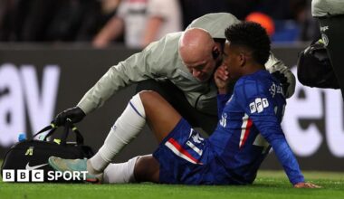 Estevao Willian having treatment on the pitch against Manchester United