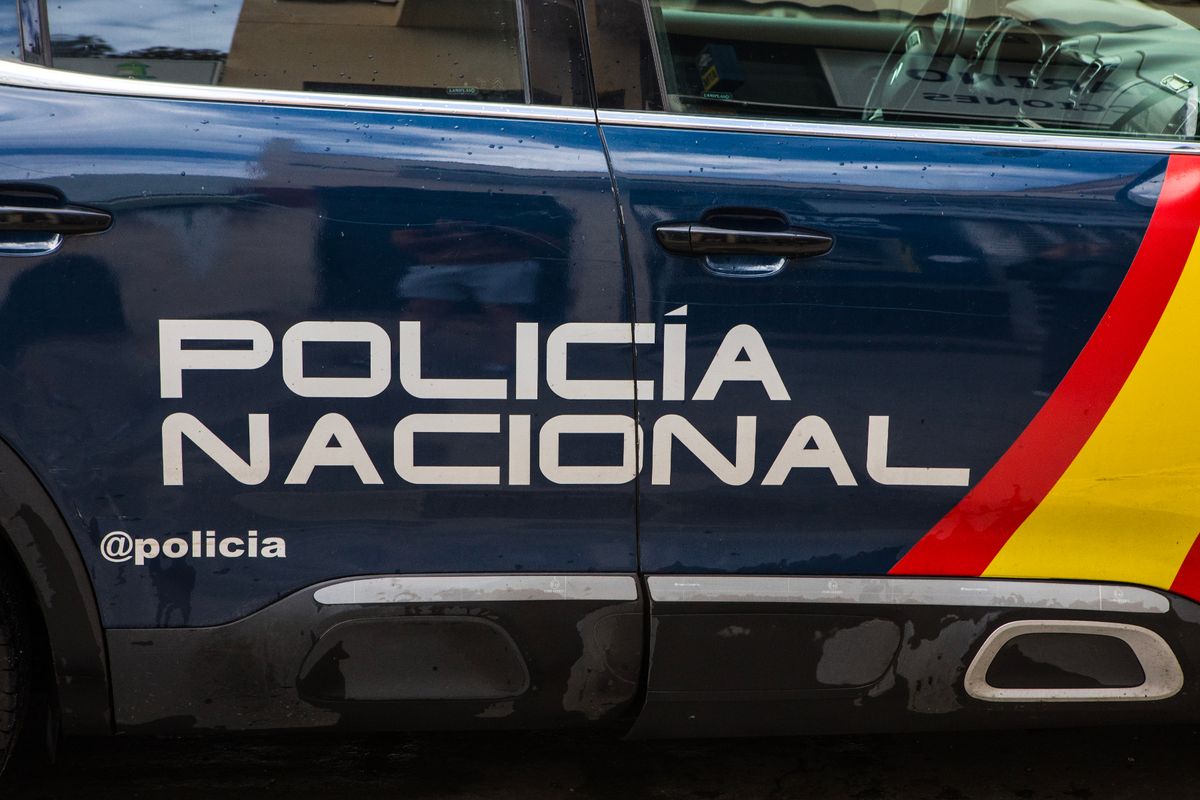 Benalmadena, Spain - April 27th 2024: Close-up of the Nacional Policia logo on the side of a police car in the town of Benalmadena in Spain.