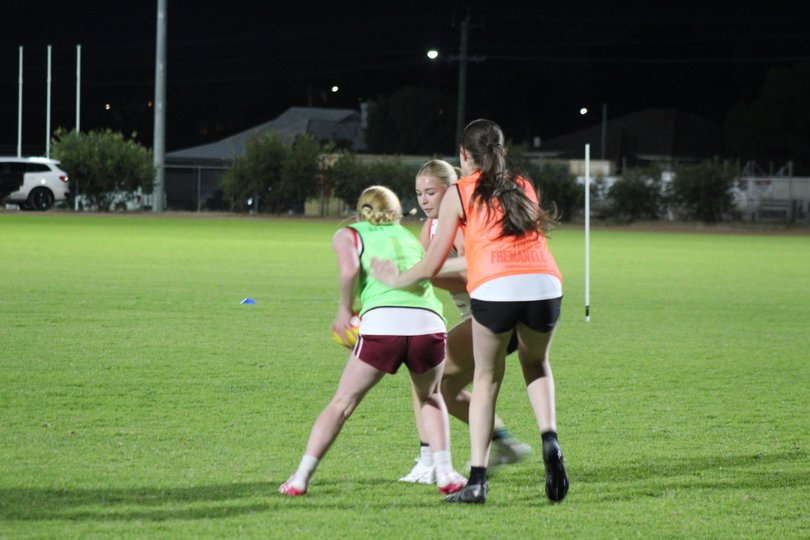 Hope Hayes fighting for the ball.