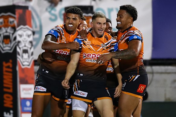 Adam Doueihi celebrates scoring his first try of the night against Canberra.